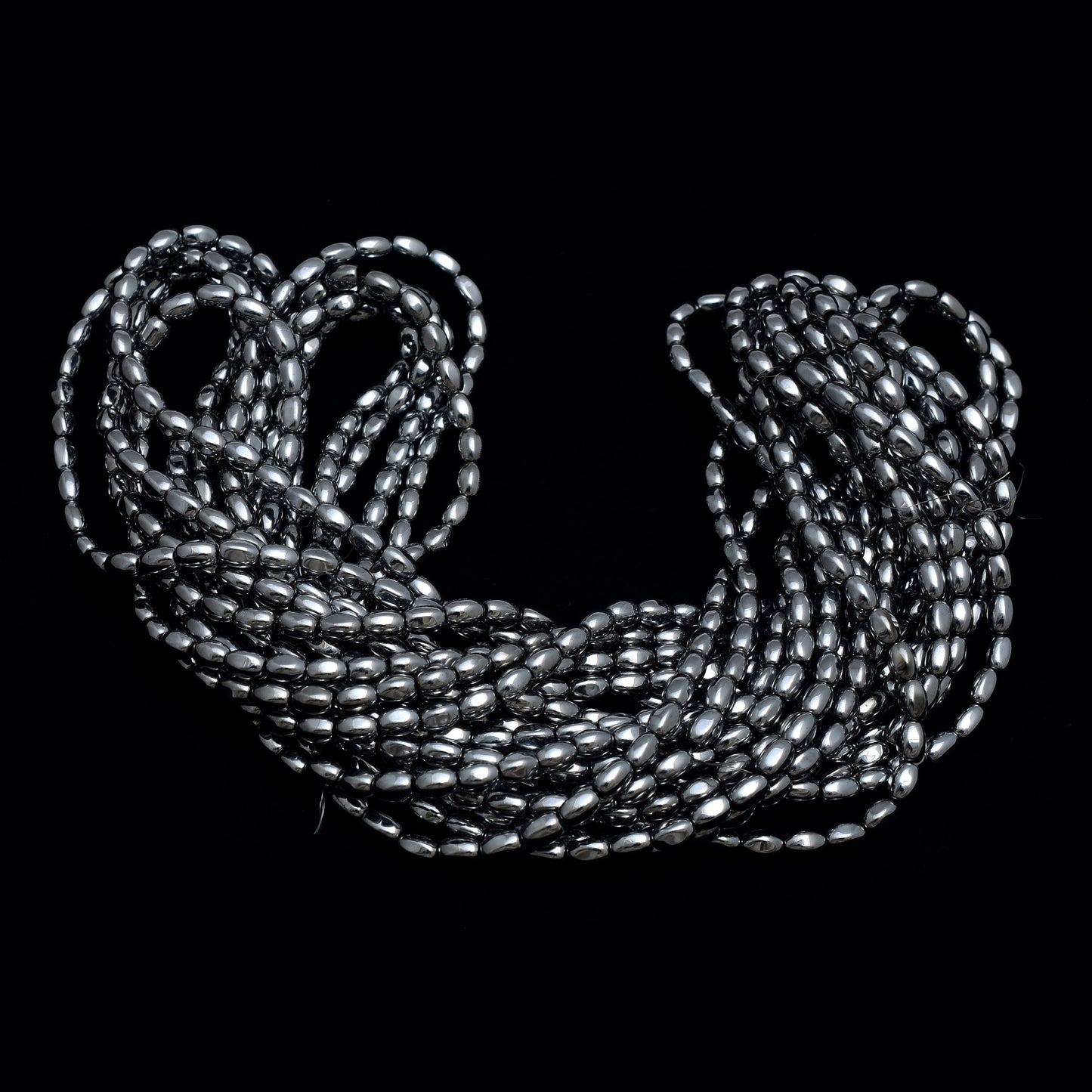 Kamal Gems | Gray Barrel-Shaped Hematite Beads Strand